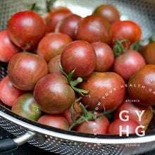 Load image into Gallery viewer, Black Cherry Heirloom Tomato in a Silver Strainer -- Perfect for snacking!