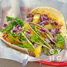 Load image into Gallery viewer, Cream Sausage (aka: Banana Cream) is a Tom Wagner Variety shown diced and added to tacos along with other heirloom varieties