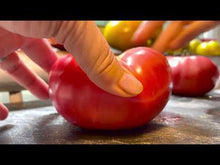 Load and play video in Gallery viewer, German Johnson Heirloom Tomato Being Sliced Open