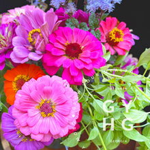Load image into Gallery viewer, Colorful zinnias in an array of shade along with lemon basil make for a wonderful smelling arrangement
