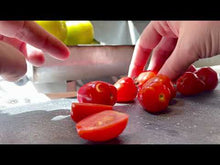 Load and play video in Gallery viewer, Here we slice open a couple of the Gardener&#39;s Sweetheart Cherry Tomatoes. They have a heart shape when sliced open.

